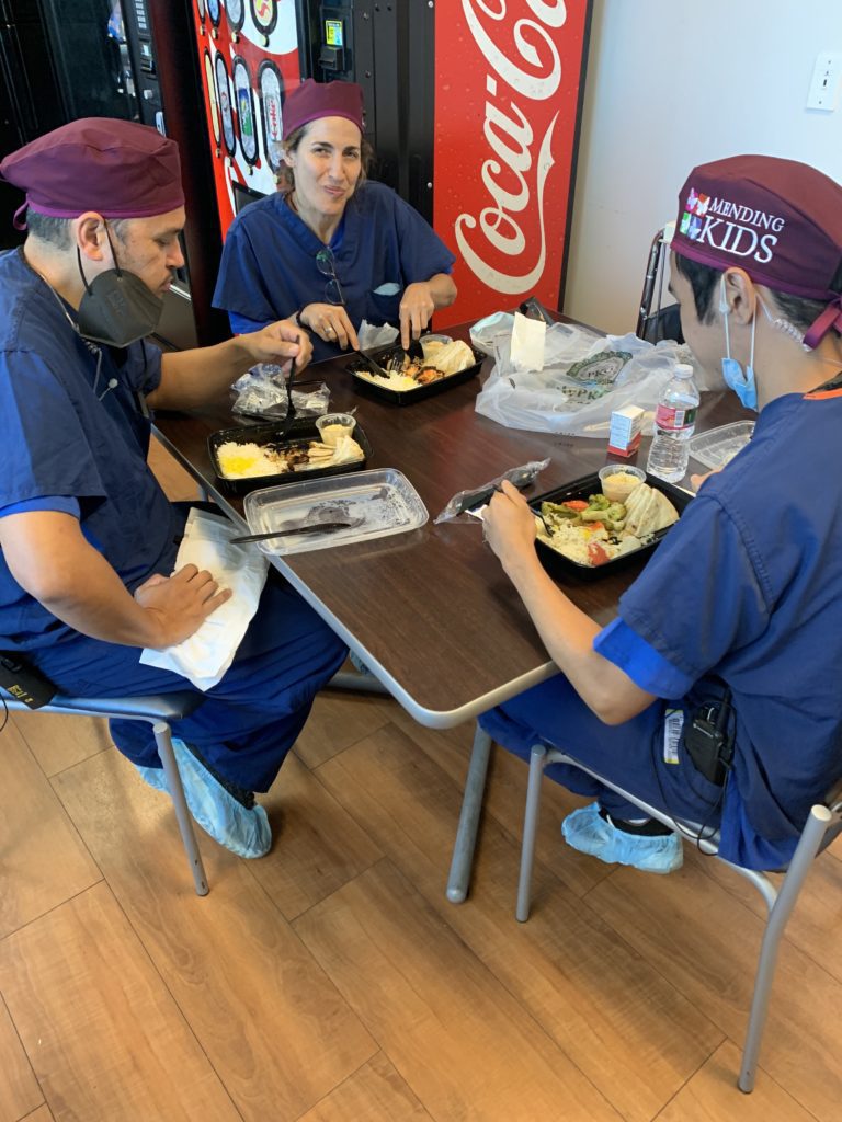 Mending Kids volunteer doctors eating Panini Kabob Grill at lunchtime